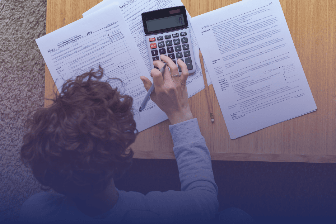person calculating bills